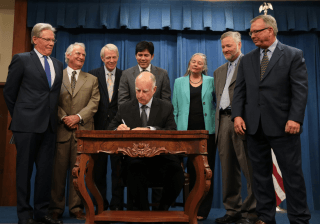 Governor Brown signs historic groundwater legislation. Photo credit: Justin Short, Office of the Governor.